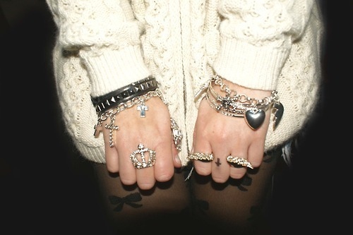 bows, bracelets and cardigan