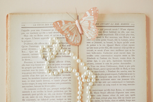book, butterfly and pearls