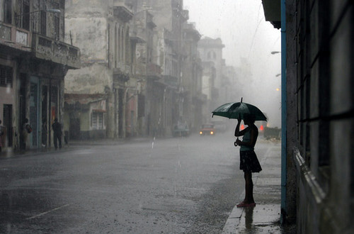http://favim.com/orig/201108/17/alone-girl-photography-rain-umbrella-Favim.com-124878.jpg
