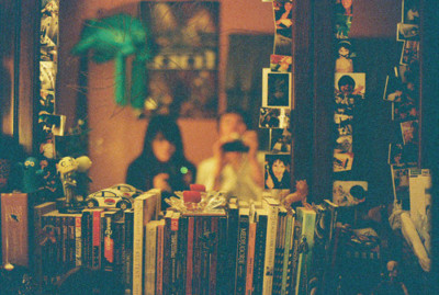 books,  camera and  couple