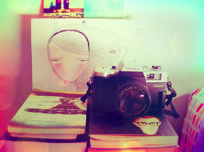 books,  camera and  drawing