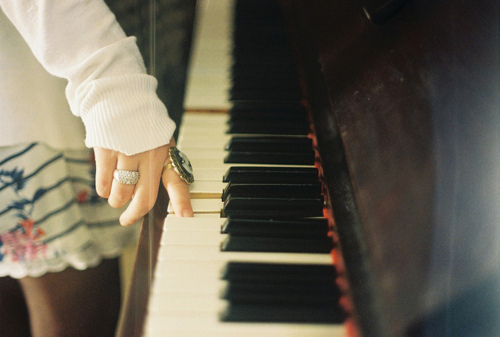 girl, hand and piano