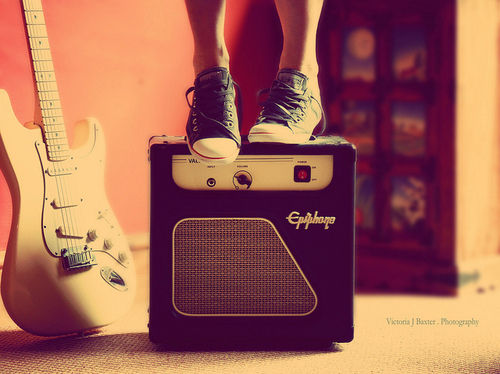 amp, converse and guitar