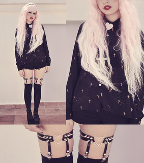 black hair pale skin, cross and eyes