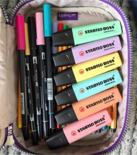 notebook, post it and banner