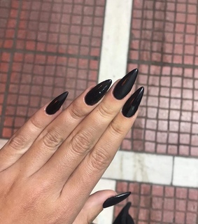 black, gel nails and long stiletto nails