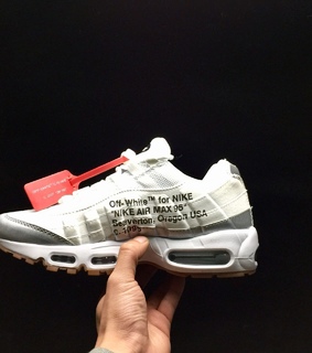 white, puma and adidas