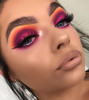 bronze, smokey eyeshadow and wing eyeliner