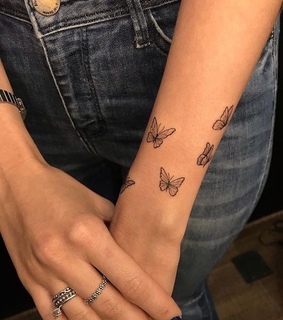 arm, tattoos and foot